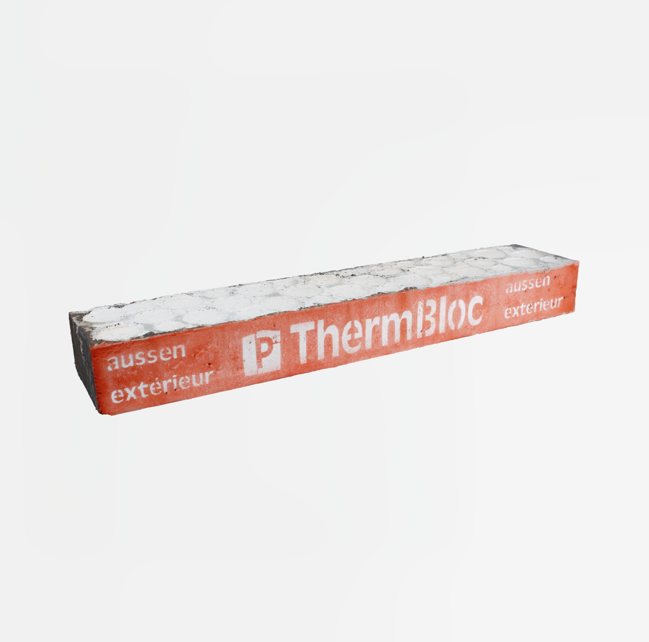 Baustein mit roter Verpackung und der Aufschrift "ThermBloc aussen exterieur"
