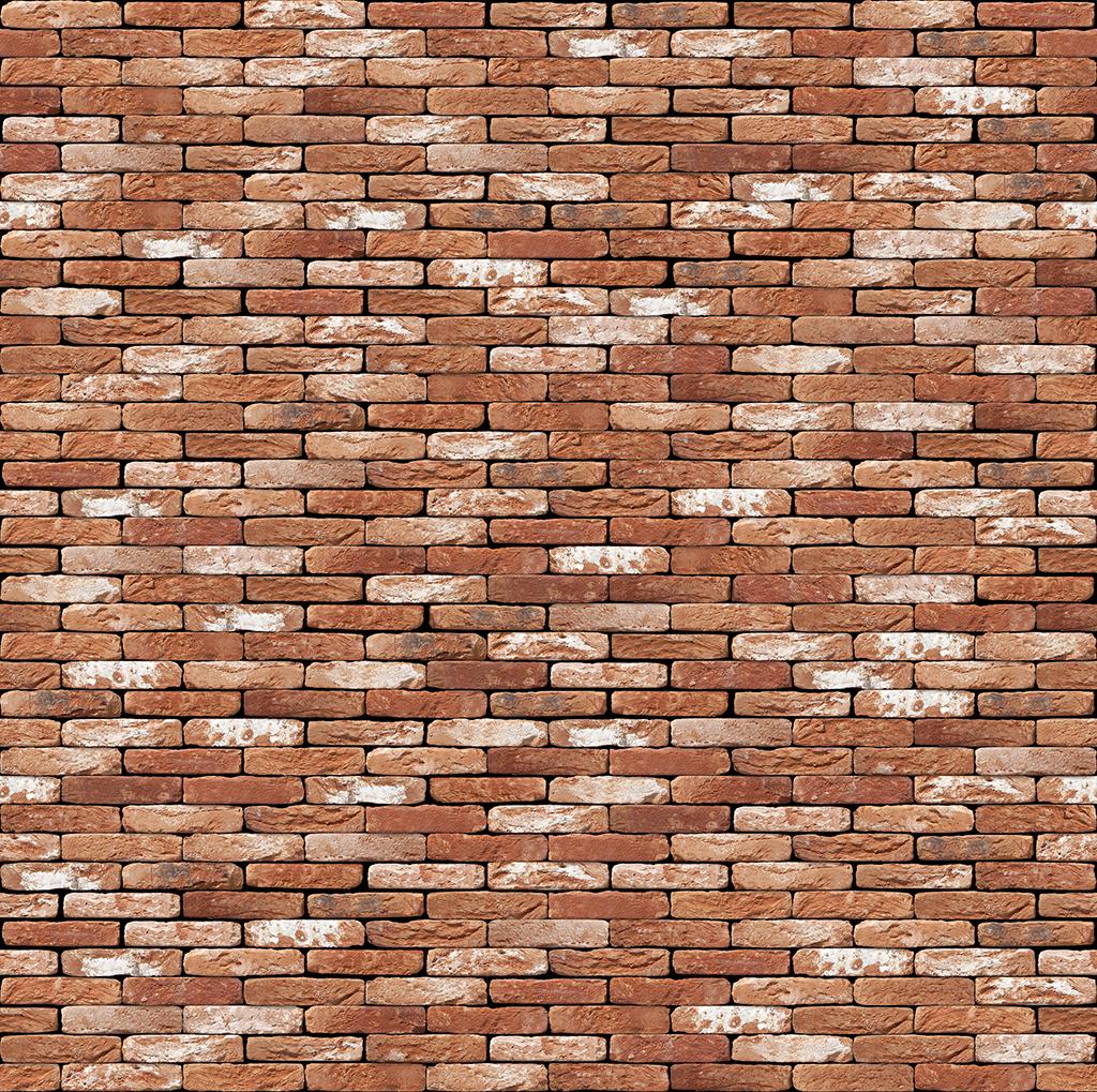 Rote Backsteinmauer mit unregelmaessigen weißen Flecken