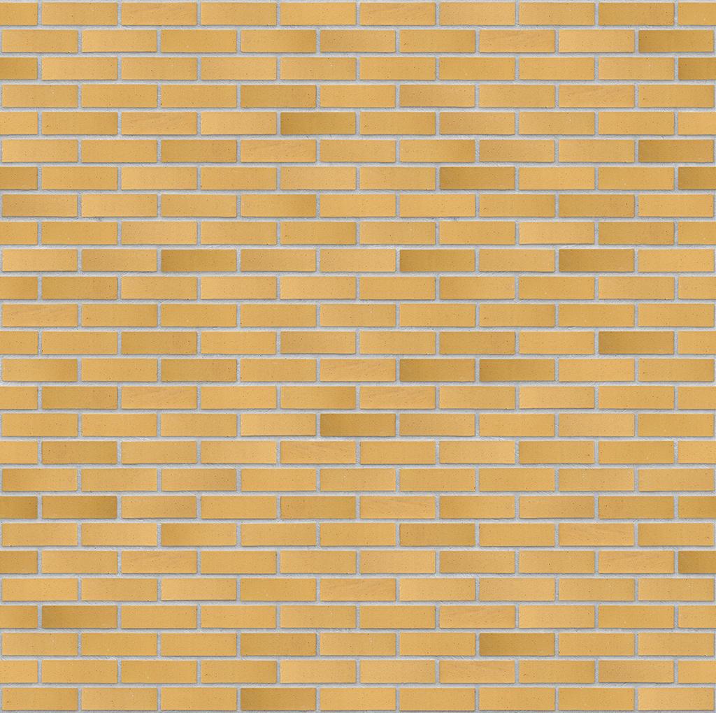 Gelbe Backsteinmauer mit regelmaessigem Fugenmuster