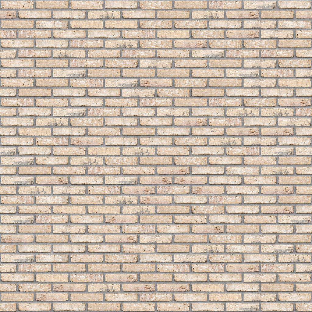 Beige Ziegelsteinmauer mit regelmaessigem Muster