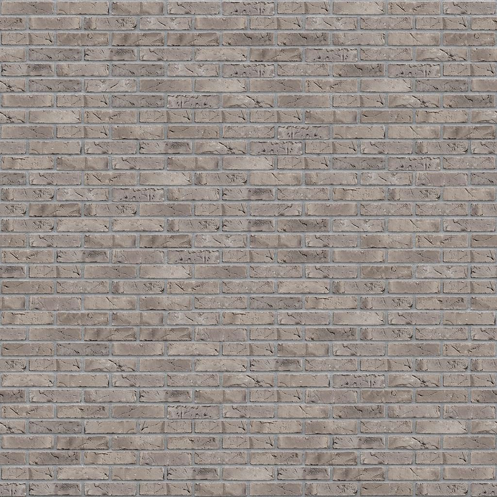 Graue Backsteinmauer mit gleichmaessigem Muster
